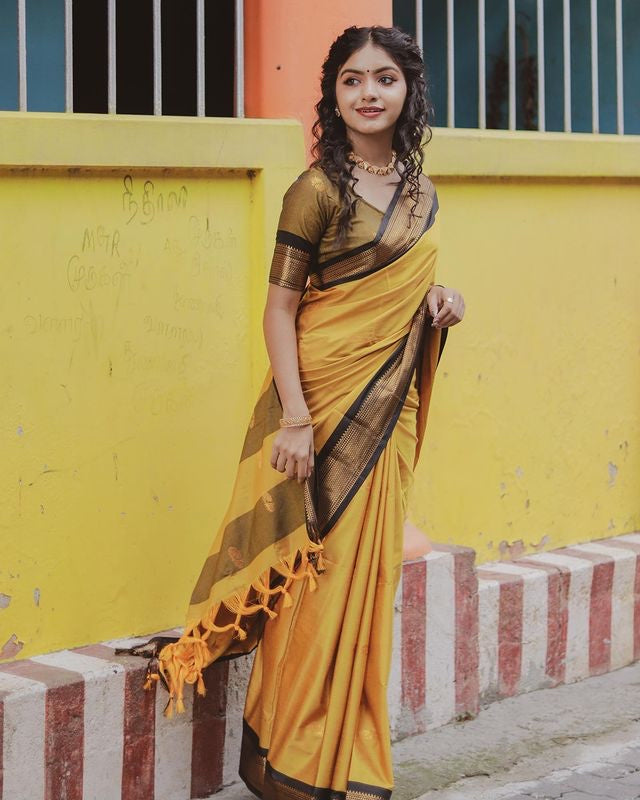 SYMMETRICAL YELLOW & BLACK PURE SOFT SILK SAREE WITH ENGROSSING BLOUSE PIECE