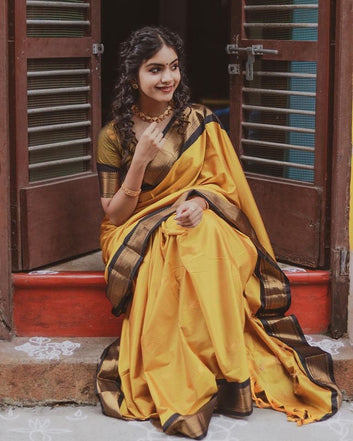 SYMMETRICAL YELLOW & BLACK PURE SOFT SILK SAREE WITH ENGROSSING BLOUSE PIECE