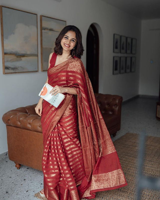 RED PURE BANARASI SILK SAREE WEAVED WITH COPPER ZARI COMES WITH ATTACHED BLOUSE.