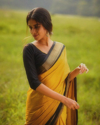 SYMMETRICAL YELLOW & BLACK PURE SOFT SILK SAREE WITH ENGROSSING BLOUSE PIECE