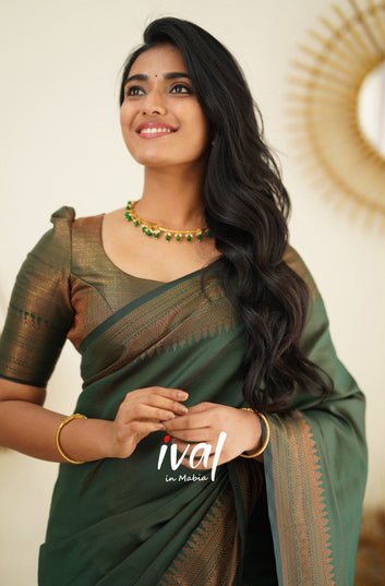 GREEN PURE SOFT SEMI SILK SAREE WITH MOIETY BLOUSE PIECE