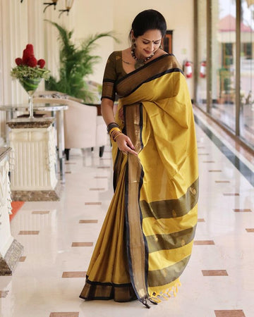 SYMMETRICAL YELLOW & BLACK PURE SOFT SILK SAREE WITH ENGROSSING BLOUSE PIECE