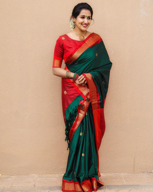 SYMMETRICAL RAMA & GAJRI PURE SOFT SILK SAREE WITH ENGROSSING BLOUSE PIECE