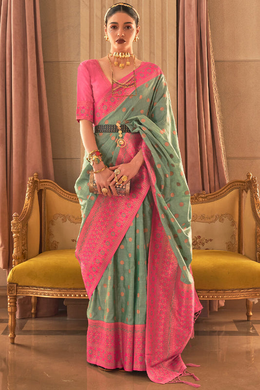 Prominent Sea Green Soft Banarasi Silk Saree With Fairytale Blouse Piece