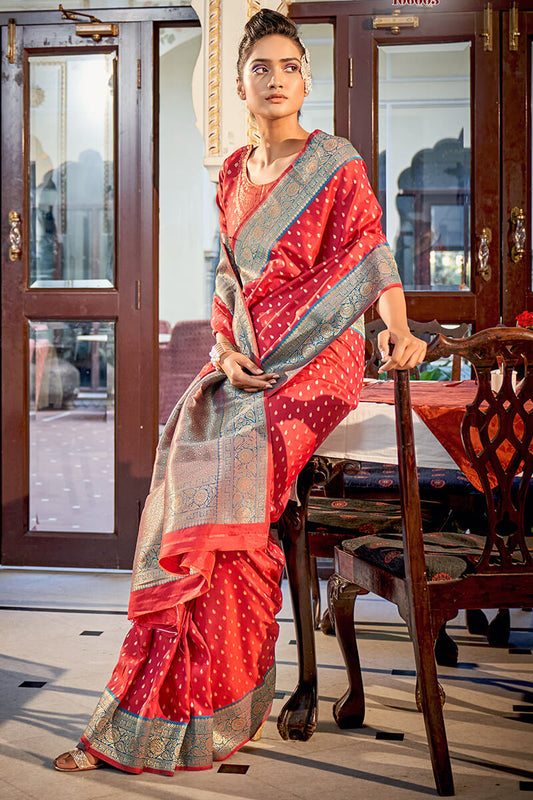 Bewitching Red Soft Banarasi Silk Saree With Fairytale Blouse Piece