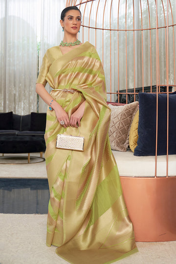 Evocative Green Organza Silk Saree With Mellifluous Blouse Piece