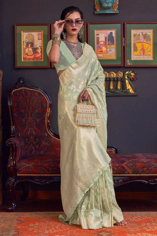 Divine Pista Soft Banarasi Silk Saree With Demure Blouse Piece