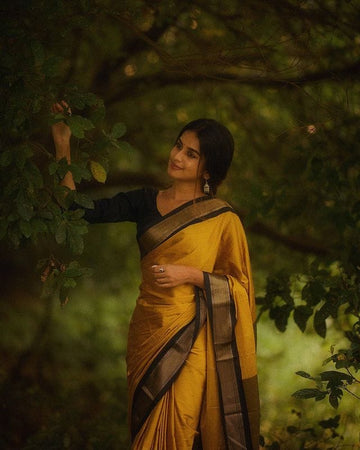 SYMMETRICAL YELLOW & BLACK PURE SOFT SILK SAREE WITH ENGROSSING BLOUSE PIECE