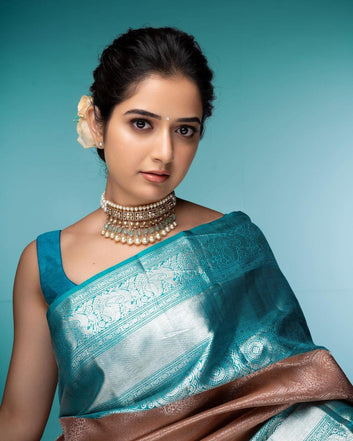 PEACH & FIROZI PURE SOFT SILK SAREE WITH TWIRLING BLOUSE PIECE