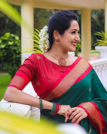 SYMMETRICAL RAMA & GAJRI PURE SOFT SILK SAREE WITH ENGROSSING BLOUSE PIECE