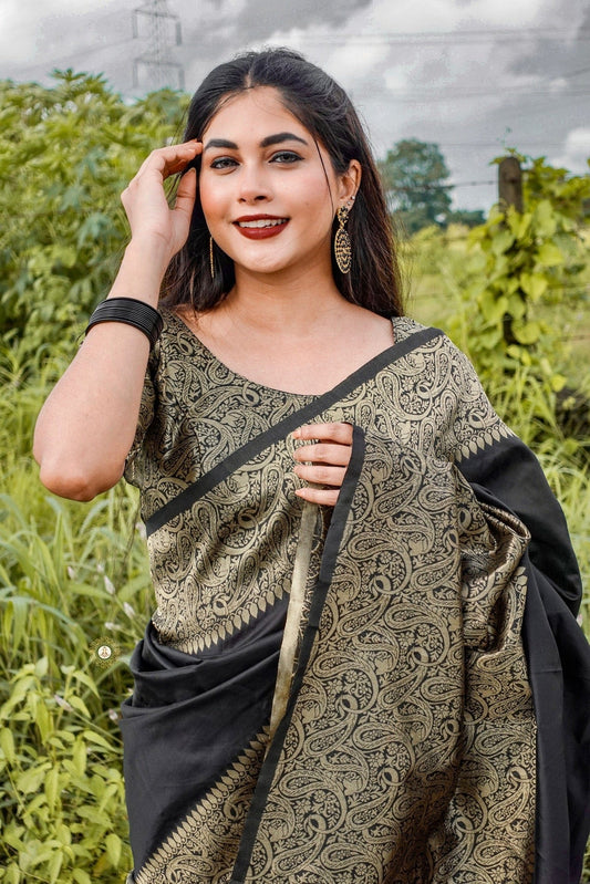 BLACK SEMI SILK SAREE WEAVED WITH GOLDEN ZARI WITH ATTACHED HEAVY BROCADE BLOUSE