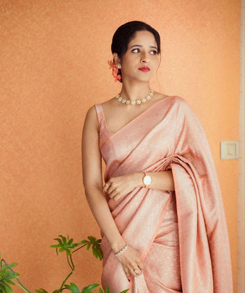 PEACH SEMI SILK SAREE WEAVED WITH SILVER ZARI WITH ATTACHED HEAVY BROCADE BLOUSE