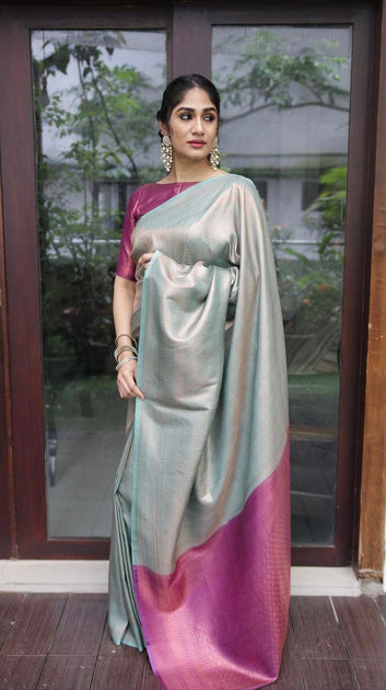 PHENOMENAL FIROZI & MAGENTA PURE SOFT SILK SAREE WITH IMBRICATION BLOUSE PIECE