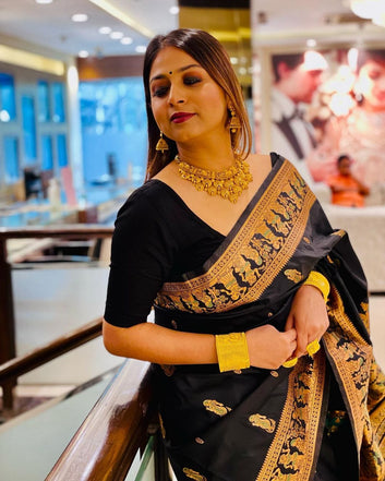 SYMMETRICAL BLACK PURE SOFT SILK SAREE WITH ENGROSSING BLOUSE PIECE