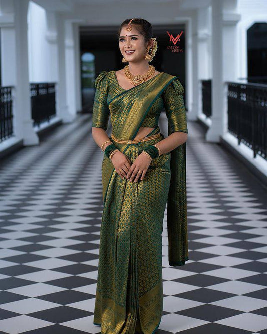 STUNNING DARK GREEN SEMI SILK SAREE WEAVED WITH GOLDEN ZARI WITH ATTACHED BROCADE BLOUSE