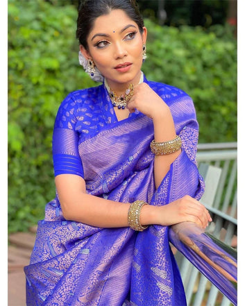 SYMMETRICAL BLUE PURE SOFT SILK SAREE WITH ENGROSSING BLOUSE PIECE