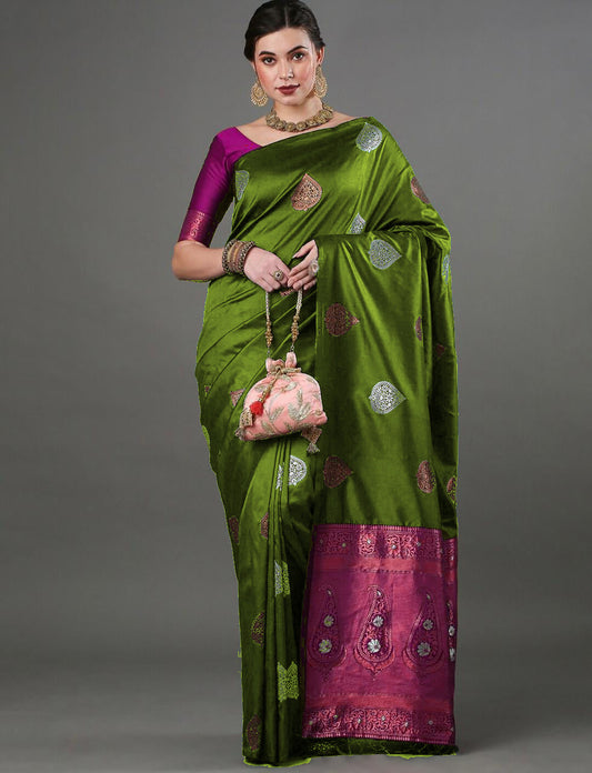 Enticing Mahndi Soft Silk Saree With Gossamer Blouse Piece