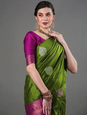 Enticing Mahndi Soft Silk Saree With Gossamer Blouse Piece