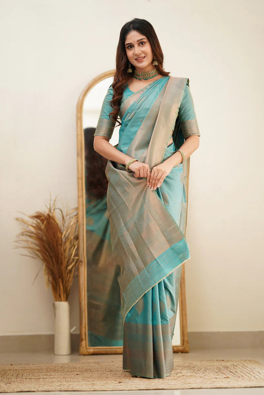 Glittering Turquoise Soft Silk Saree With Tempting Blouse Piece