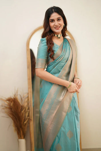 Glittering Turquoise Soft Silk Saree With Tempting Blouse Piece