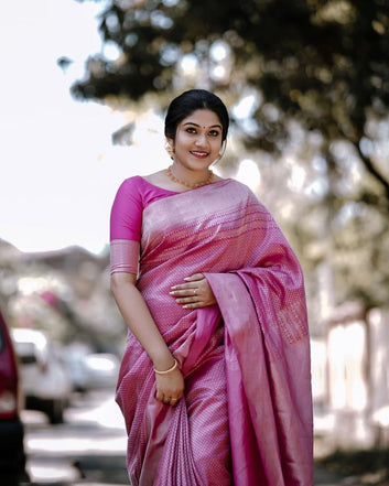 Eye-Catching Pink Soft Silk Saree With Blooming Blouse Piece