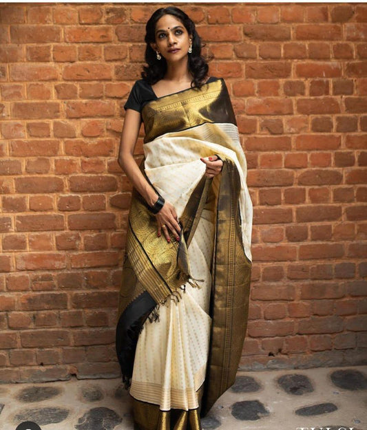 Vestigial Off White Soft Silk Saree With Symmetrical Blouse Piece