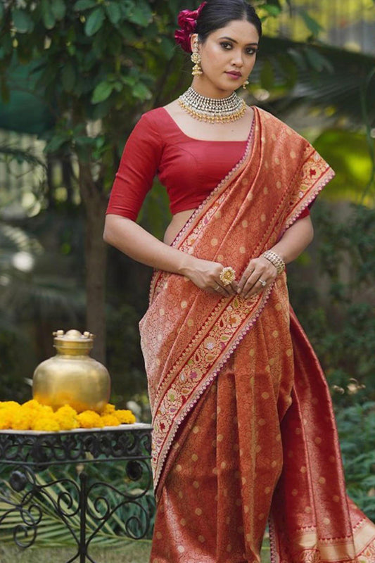 Denouement Red Soft Silk Saree With Profuse Blouse Piece