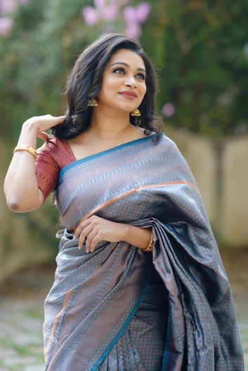 Murmurous Firozi Soft Silk Saree with Super Glittering Blouse Piece