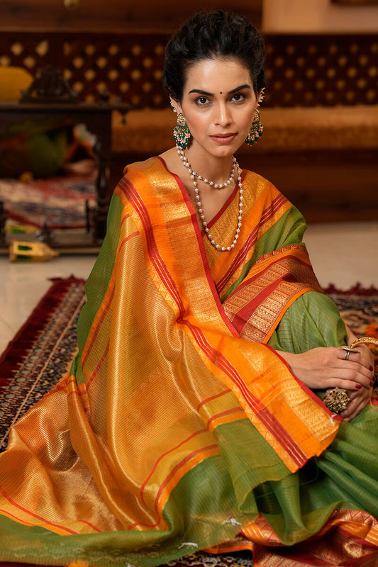 Conflate Green Soft Silk Saree With Fantabulous Blouse Piece