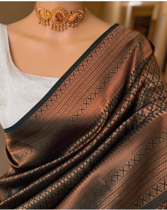 Sumptuous Green Soft Silk Saree With Demure Blouse Piece