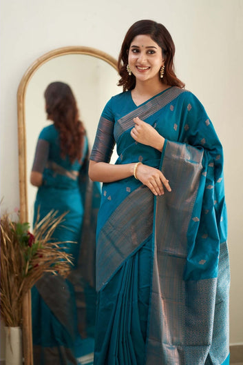 Sumptuous Firozi Soft Silk Saree With Surreptitious Blouse Piece