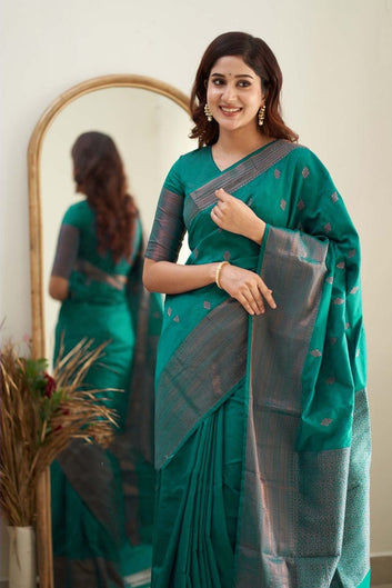 Sumptuous Rama Soft Silk Saree With Surreptitious Blouse Piece