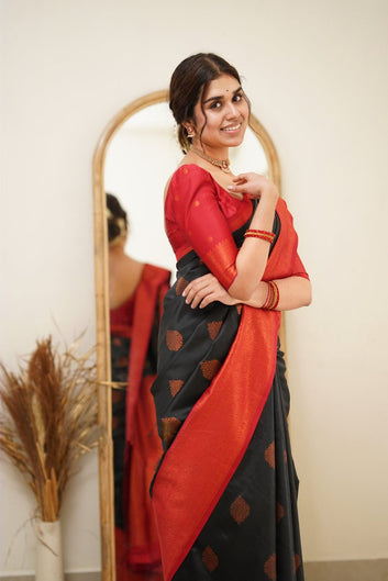 Demanding Black Soft Silk Saree with Ravishing Blouse Piece