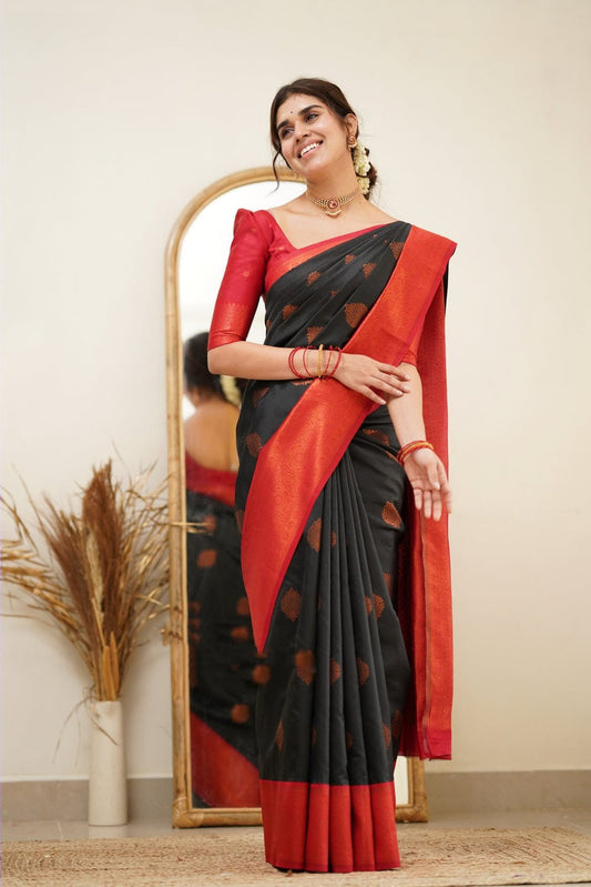 Demanding Black Soft Silk Saree with Ravishing Blouse Piece