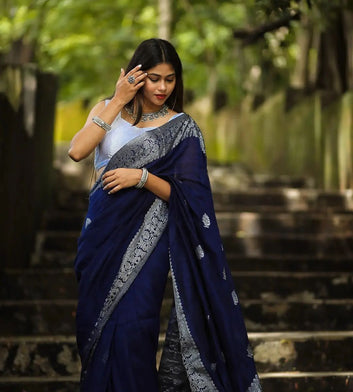 Charming Navy Blue Soft Banarasi Silk Saree With Glowing Blouse Piece